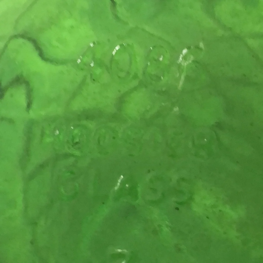 Vintage green glass vase